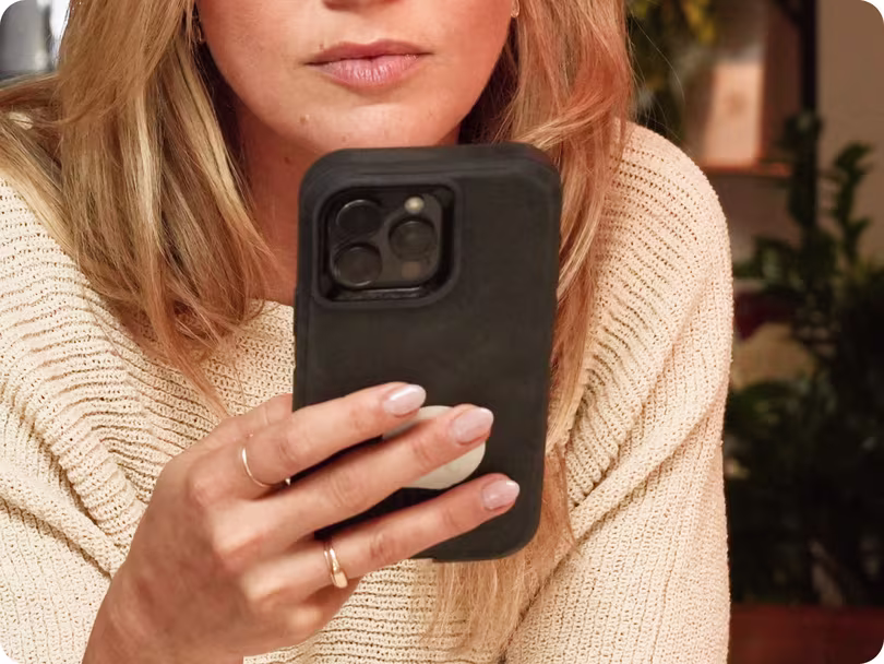 A member booking her draw from her phone at home