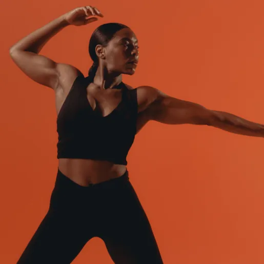 Athletic woman front strike pose